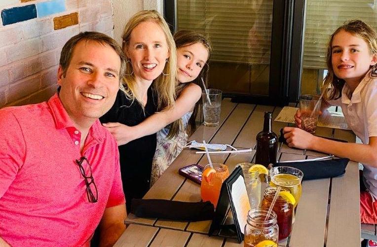 family celebrating after winning the bid on their dream home using fairway's certified pre-approval