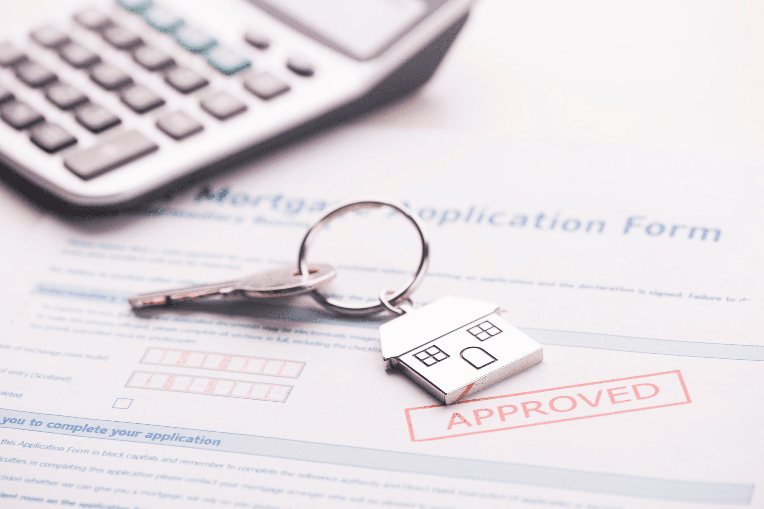 Homebuyer reviewing paperwork for the NC Home Advantage Tax Credit (MCC)