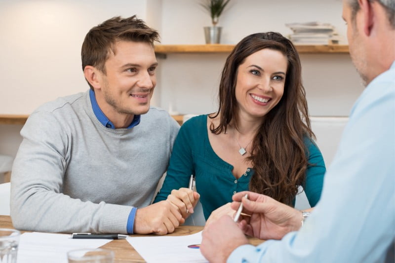 Couple Reviewing Adjustable Rate Mortgages