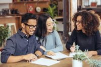 couple asking questions to mortgage lender