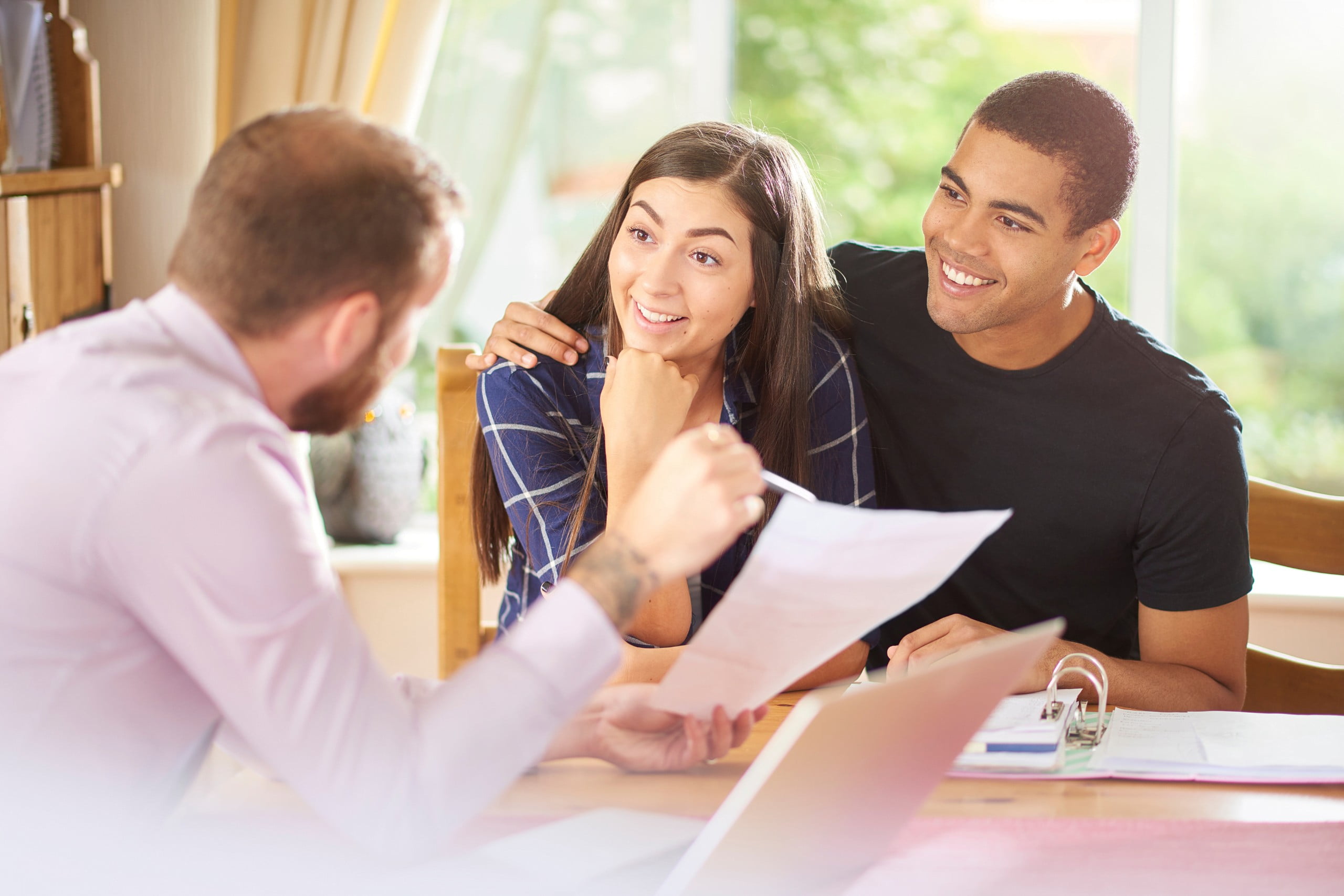 couple meeting with mortgage lender