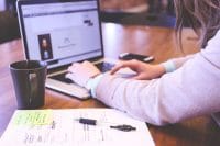 person on computer